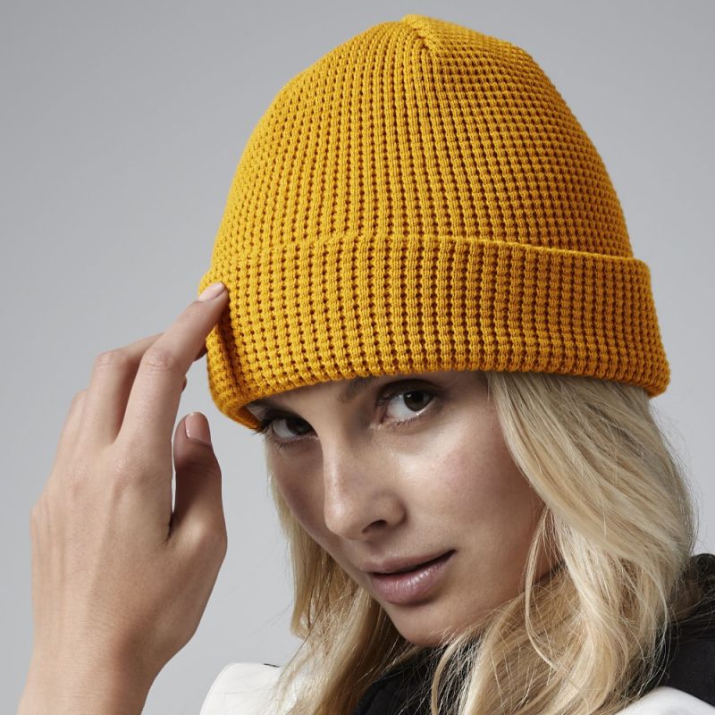 Bonnet nid d'abeille doublé avec rabat en coton organique léger et respirant