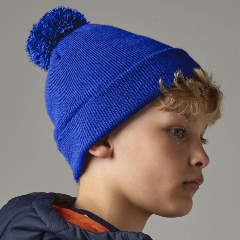 Bonnet enfant pompon uni en polyacrylique doux, tricot double épaisseur