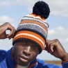 Bonnet multi-sport en polyester recyclé avec pompon, doublure micropolaire