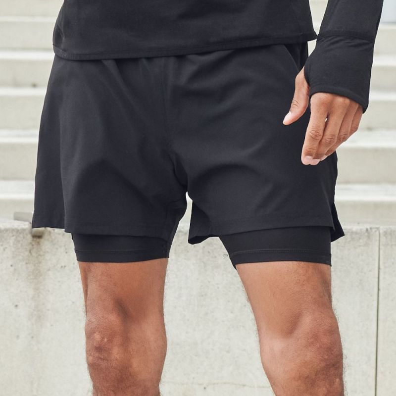 Short en microfibre extensible 4 sens, poches zippées, sous-short intégré, 180 g/m²