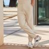 Jogging en coton régénéré et polyester recyclé, taille et bas élastiqués, 260 g/m²
